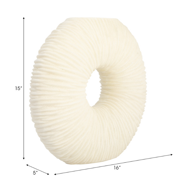 Round ivory vase with a hole in the middle and textured surface, with height, depth and width dimensions.
