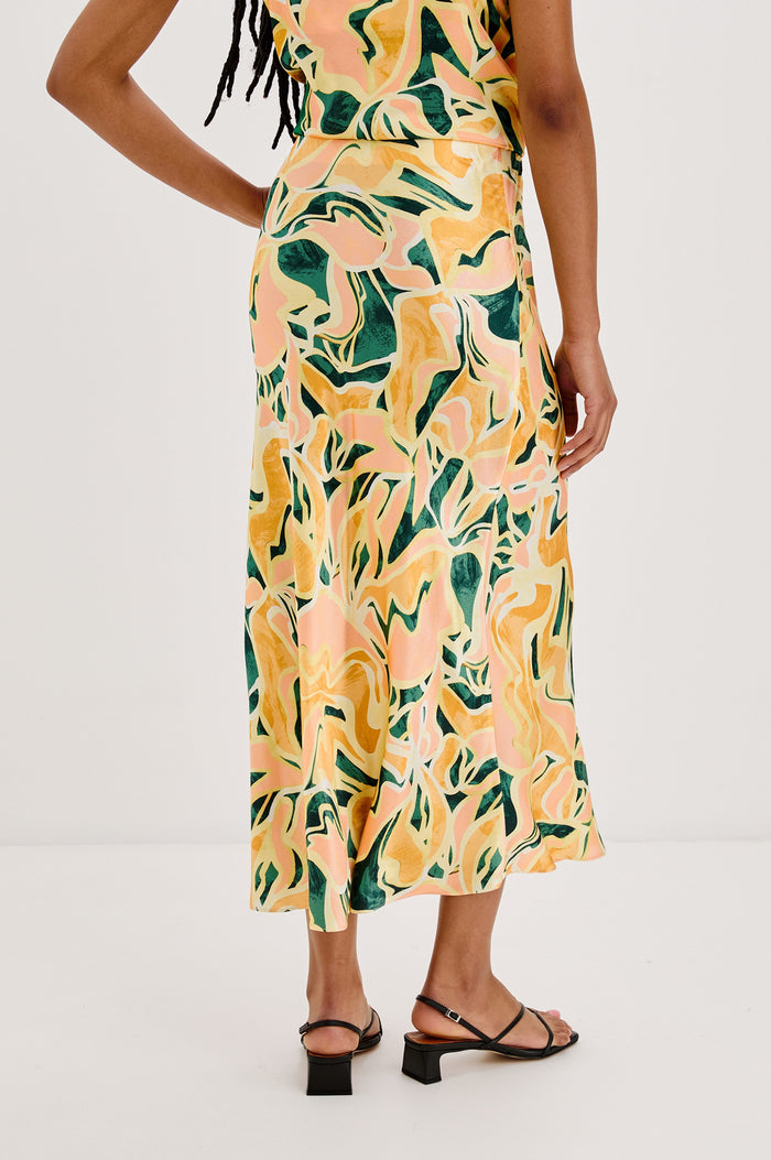 Anya Midi Skirt in Tulum Colorway. Back View Shown on Model.