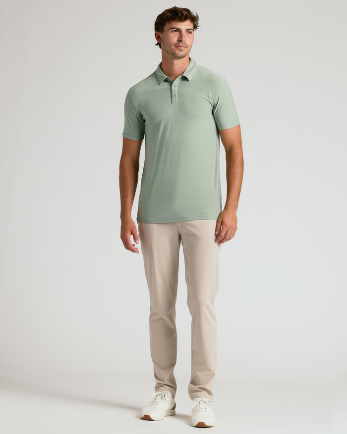 Young man models Lichen Short Sleeve Tall Active Polo.