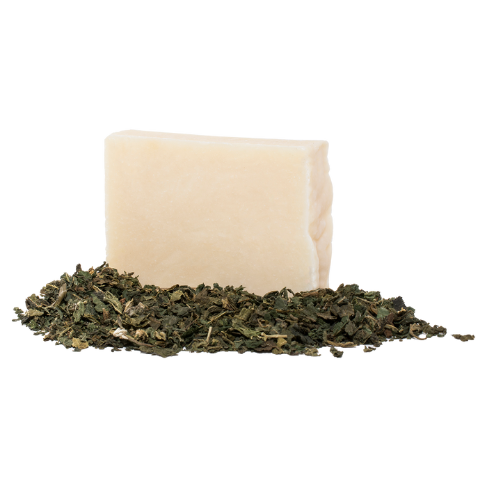 Nettle Sabu Soap | Vie Healing natural beige soap bar resting on a bed of dried nettle leaves, promoting skincare and body care wellness.