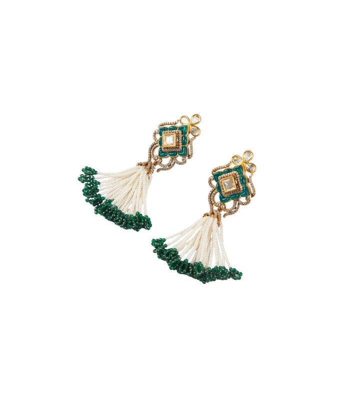 Kundan tassel earrings with teal center, white thread fringe and green tassels