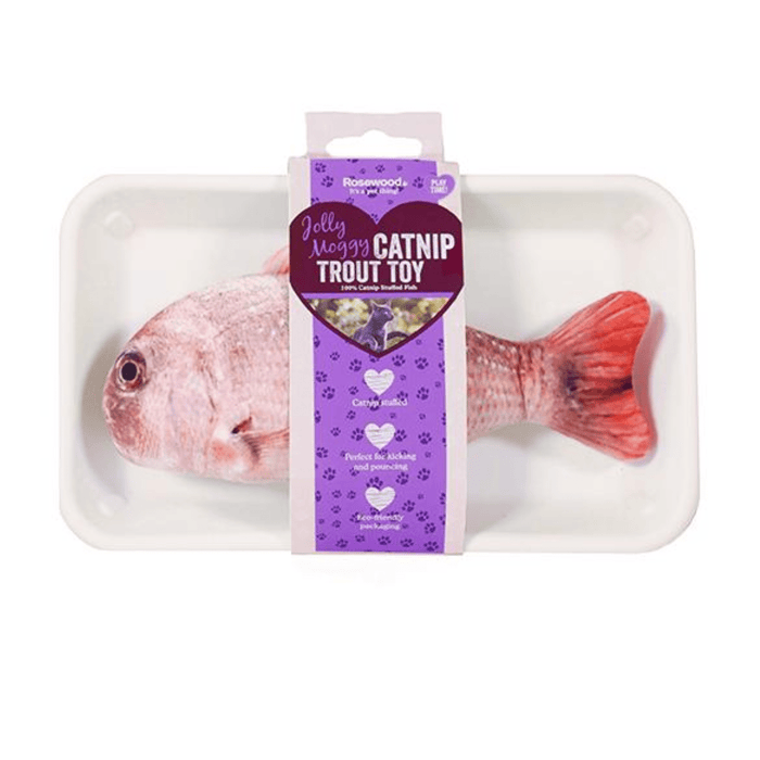 Realistic red snapper fish cat toy pictured in tray packaging with a purple cardboard wrap around tag, with text on saying 'Jolly Moggy Catnip Trout Toy'. Pictured on a white background.