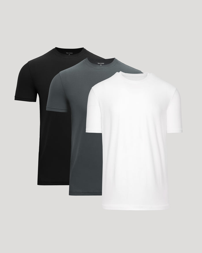 Three t-shirts in black, gray, and white on a light gray background