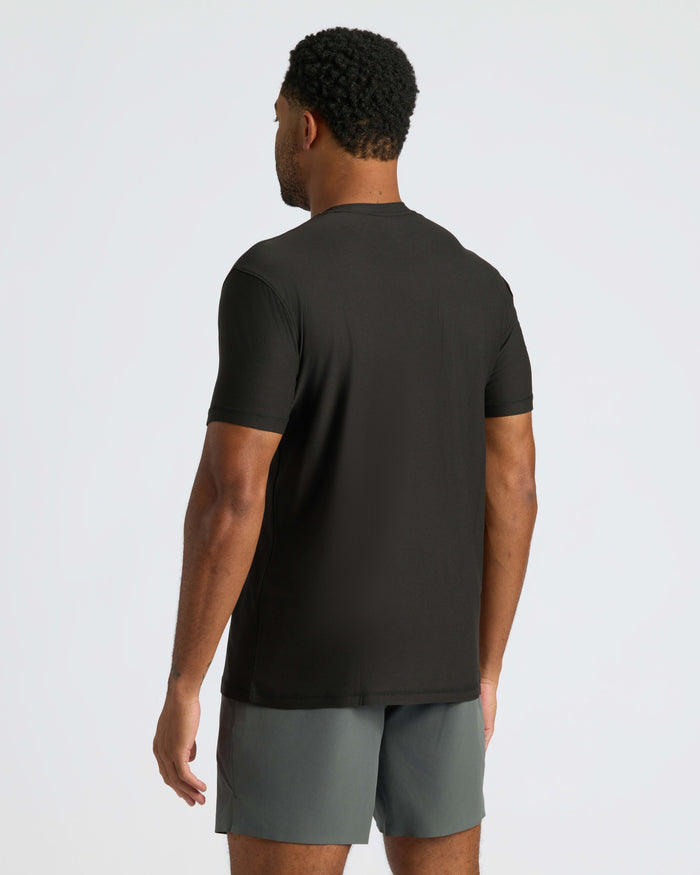 Black Active Crew Neck Tee on man, showing back and side profile.