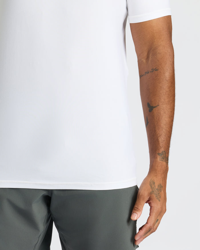 White Active Crew Neck Tee on person with tattooed arm.