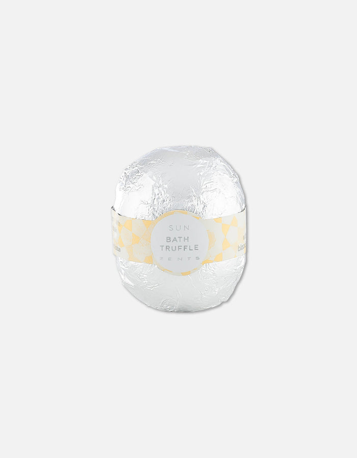 Silver-wrapped Bath Truffle | Zents with a pale yellow geometric patterned label, designed for a luxurious and relaxing skincare experience.
