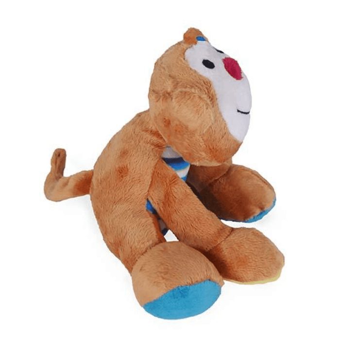 Side view of brown monkey dog toy with cream face, red nose and black stitched eyes and smile details. Stripy blue belly, blue ears, blue and yellow feet pictured on a white background.