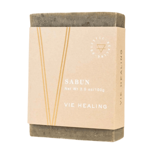 Clay Sabun Soap | Vie Healing bar wrapped in minimalist beige packaging featuring subtle gold accents, promoting natural skincare and holistic healing.