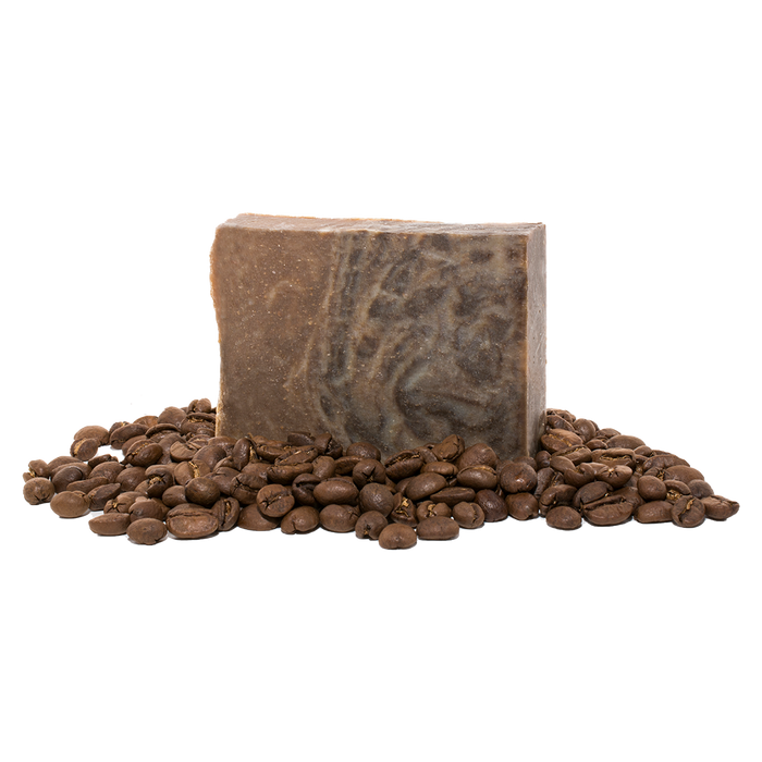 Bar of Coffee Sabun Soap | Vie Healing surrounded by whole coffee beans, highlighting its natural skincare and body care benefits.