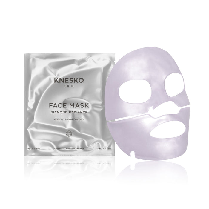Diamond Radiance Face Mask - Single | Knesko displayed with its sleek silver packaging and a luminous skincare mask designed for brightening and hydrating the face.