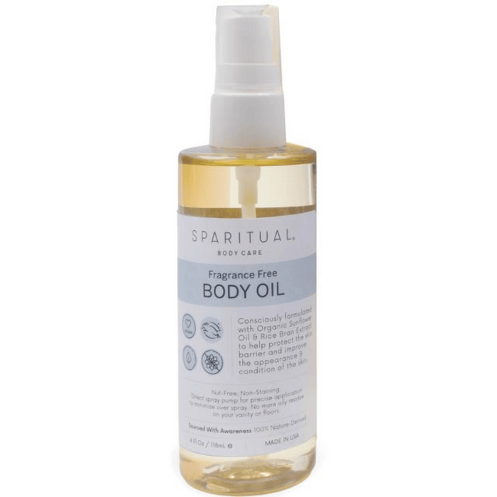 Clear bottle of Fragrance Free Body Oil | Sparitual with a white pump top, designed for gentle skincare and body care with organic sunflower oil and rice bran extract.