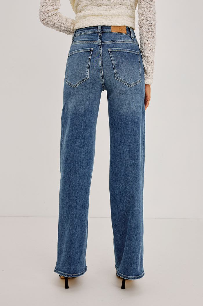 Getty Wide Leg Denim Pants with Belt Loops, Two Front Pockets and Two Back Patch Pockets in East Coast Colorway - Back View Featured on Model