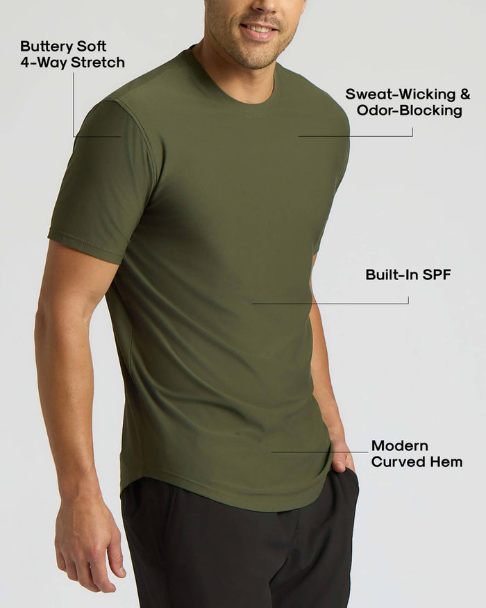 Man wearing an olive green Active Curved Hem Crew 3-Pack shirt highlighting buttery soft 4-way stretch fabric, sweat-wicking and odor-blocking features, built-in SPF, and a modern curved hem design.