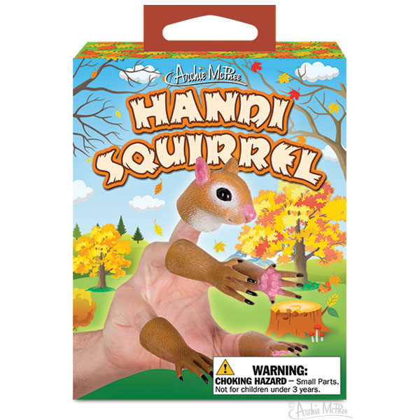 The Handisquirrel packaging features vinyl finger puppets set in a fall-themed forest scene, depicting a whimsical squirrel hand. The illustrated box enhances the charm of this playful and imaginative design.