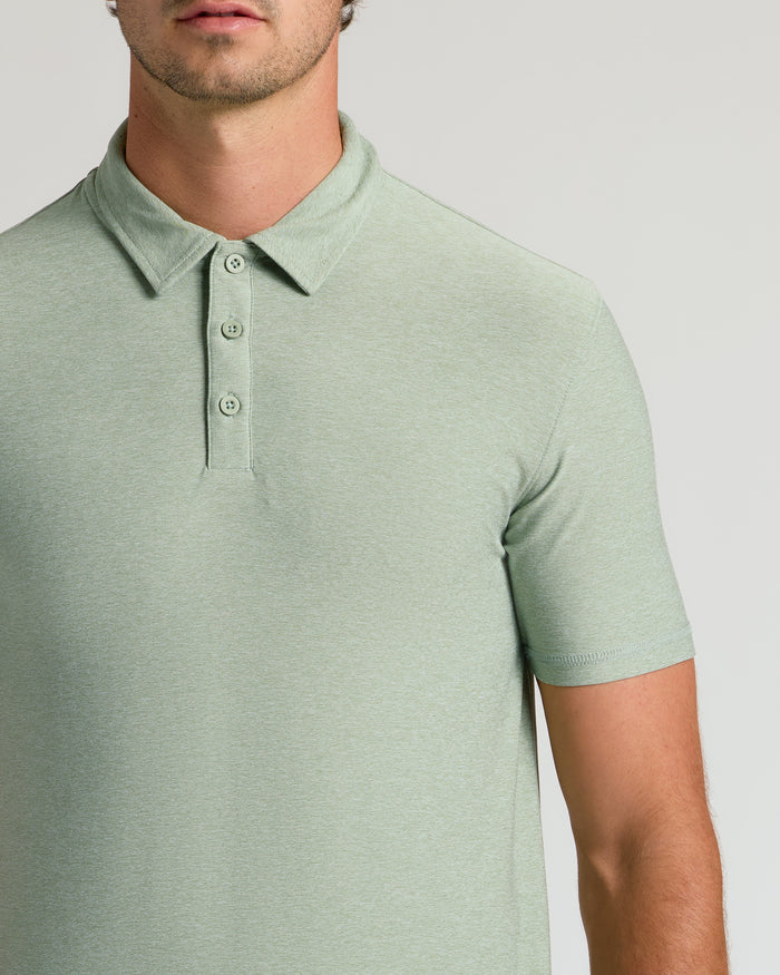 Man modeling Lichen Short Sleeve Tall Active Polo with fold-over collar.
