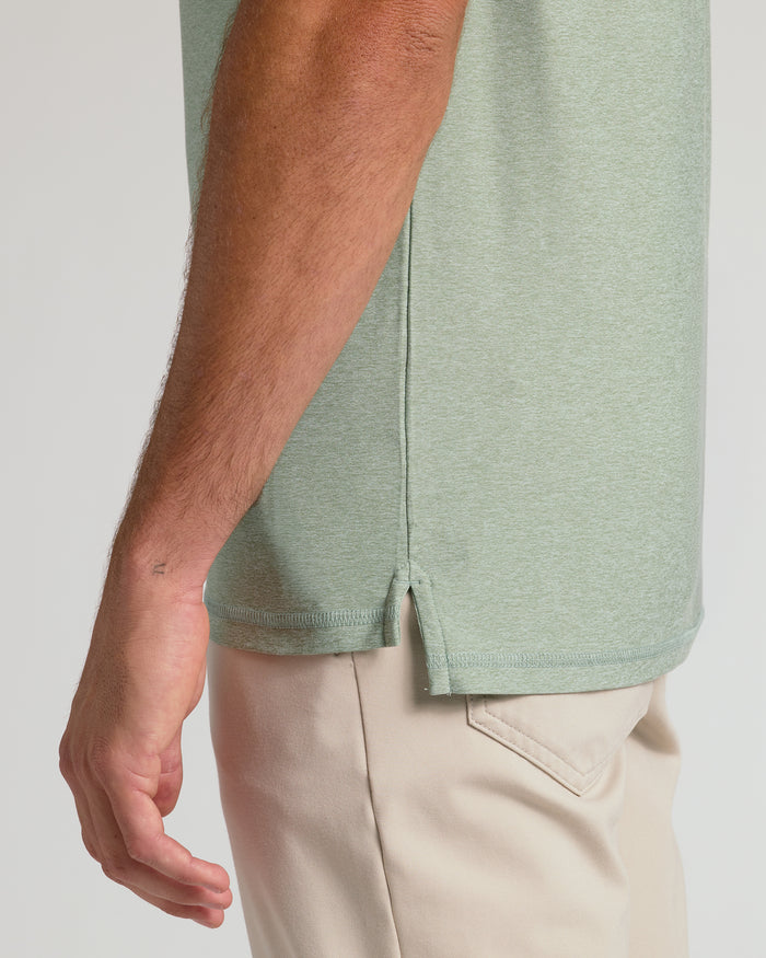 Lichen Short Sleeve Tall Active Polo with khaki pants.