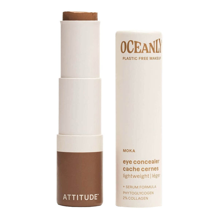 Eye concealer stick and packaging with 'Attitude' branding on a white background.