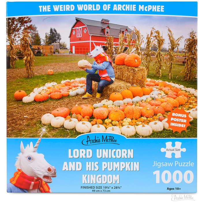 A person donning a unicorn mask is seated amidst pumpkins at a farm, surrounded by a barn and autumn trees, crafting an enchanting scene depicted in the 1000-piece Lord Unicorn and His Pumpkin Kingdom Puzzle. Ideal for puzzle enthusiasts seeking high-quality pieces to encapsulate the magic of autumn.