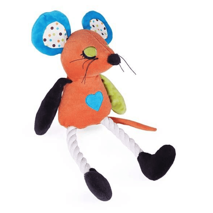 Side view of orange mouse dog toy with blue ears with polka inner ear, black nose, green eyelids with black eye lashes and whiskers, one green arm and one black, orange tail, white rope legs attached to black feet and a small blue heart stitched on the belly sat on a white background.