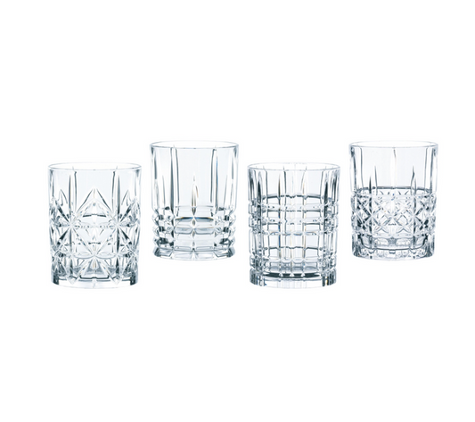 Set of 4 glas whisky tumblers with geometric patterns etched in.