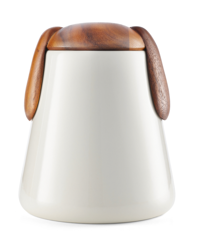 Cream ceramic dog treat cannister with acacia wood lid with dog ears embellishment.