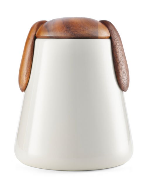 Cream ceramic dog treat cannister with acacia wood lid with dog ears embellishment.