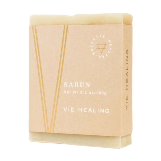 Nettle Sabu Soap | Vie Healing bar wrapped in minimalist beige packaging with subtle gold lines and holistic healing text, suitable for skincare and body care routines.