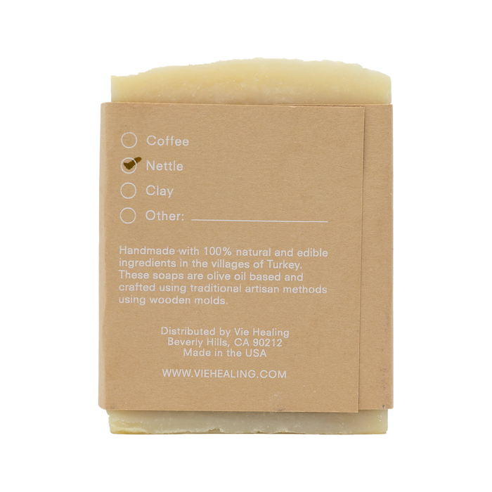 Nettle Sabu Soap | Vie Healing natural soap bar wrapped in brown paper packaging highlighting nettle ingredient, handmade with olive oil and edible components for skincare and body care.