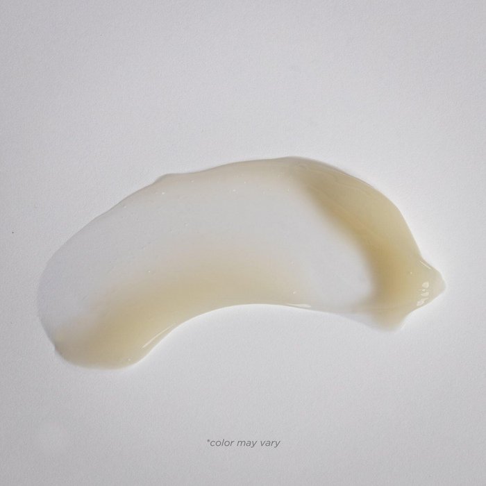 Clear gel smear on white background showcasing the texture of Optimizing Body Contour Gel | Alchimie Forever for skincare and body care wellness.