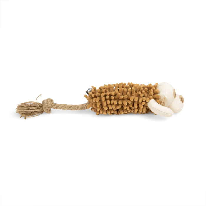Side view showing full length of monkey dog toy with a cream fabric face with brown canvas material ascents around the eyes, nose and for the arms. Brown micro-fibre body with a rope tail on a white background.