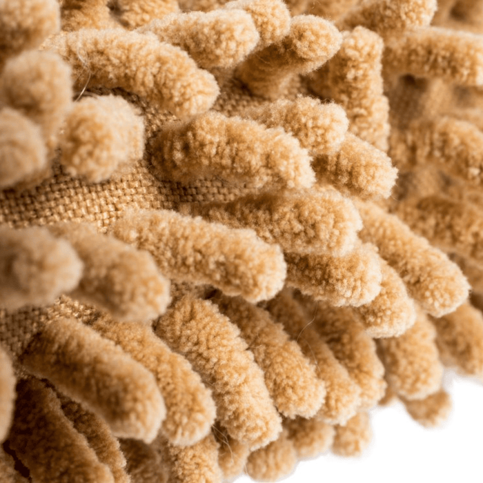 Close up of monkey dog toys brown micro-fibre body.