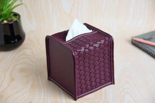 Purple woven tissue cover with open front holding white tissue