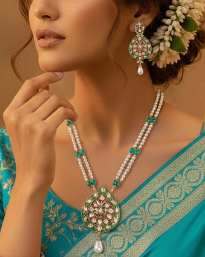 Pearl beaded pendant set with green and pink enamel kundan teardrop necklace and earrings