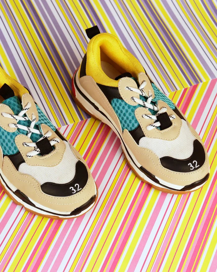 Boys' colorblock sneakers with beige, teal, black and white panels, lace-up