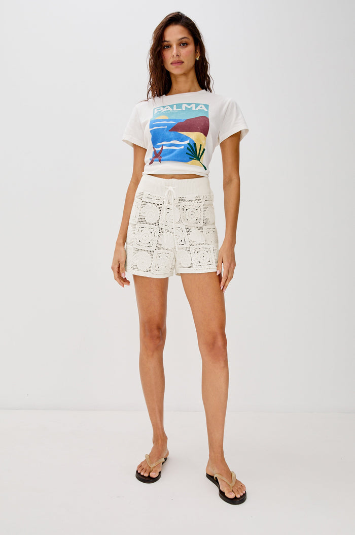 Catalina Pull On Drawstring Short with Ribbed Waistband in White Sea Shell Crochet Colorway. Full Body Front View shown on Model.