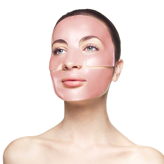 Woman wearing a pink face mask in three separate parts, demonstrating the Rose Quartz Antioxidant Face Mask - 4 Pack | Knesko for skincare and wellness.