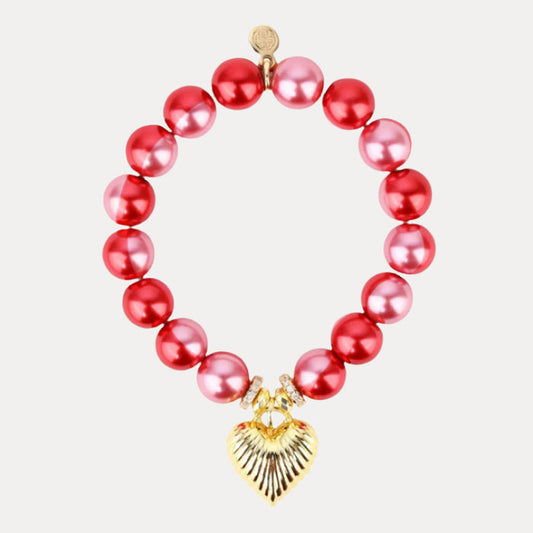 a bracelet with a heart pendant
