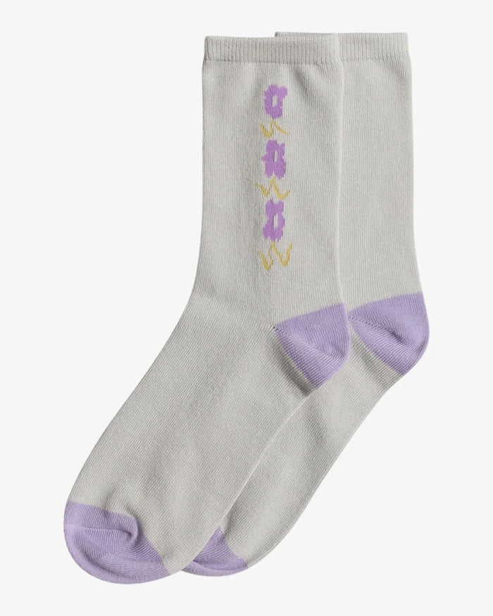 RVCA women's socks with purple accents and floral design on a white background