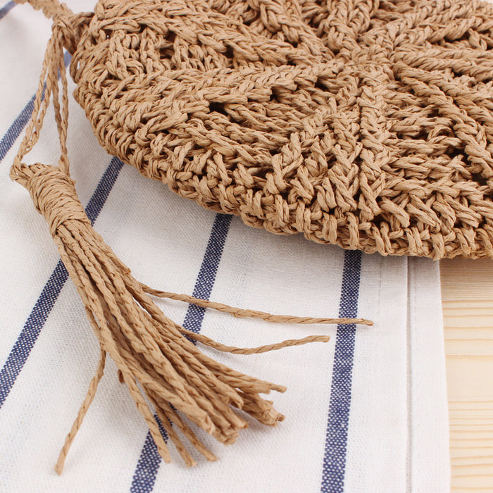 Simple round tassel women's crossbody straw woven bag 🇨🇳