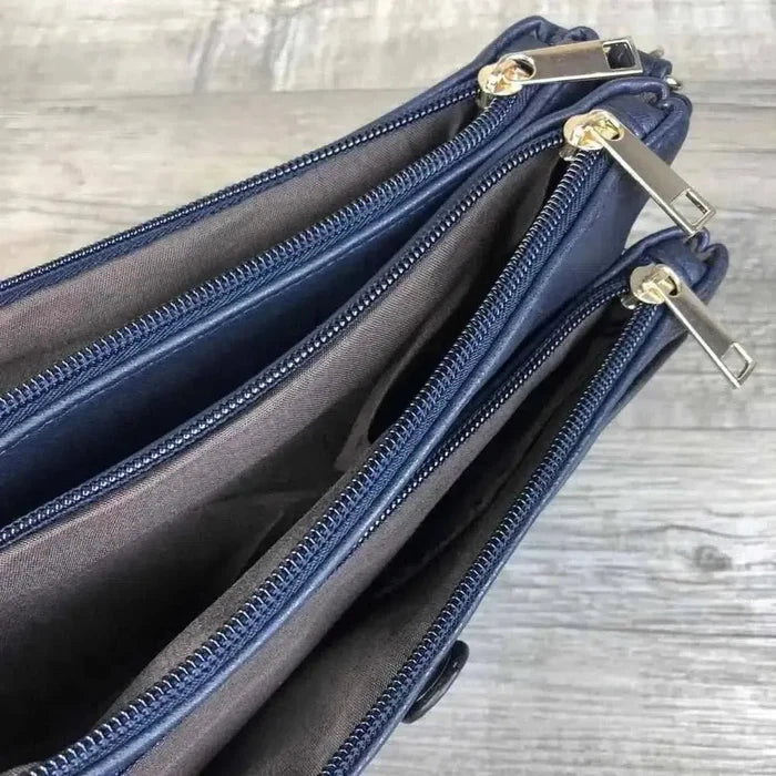 Navy PU leather Sling Bag with adjustable strap and multiple zip compartments