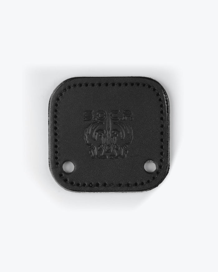 SOCP® Leather Backplate Black - Logo Detail Close-Up Embossed SOCP | Benchmade Knife Co.