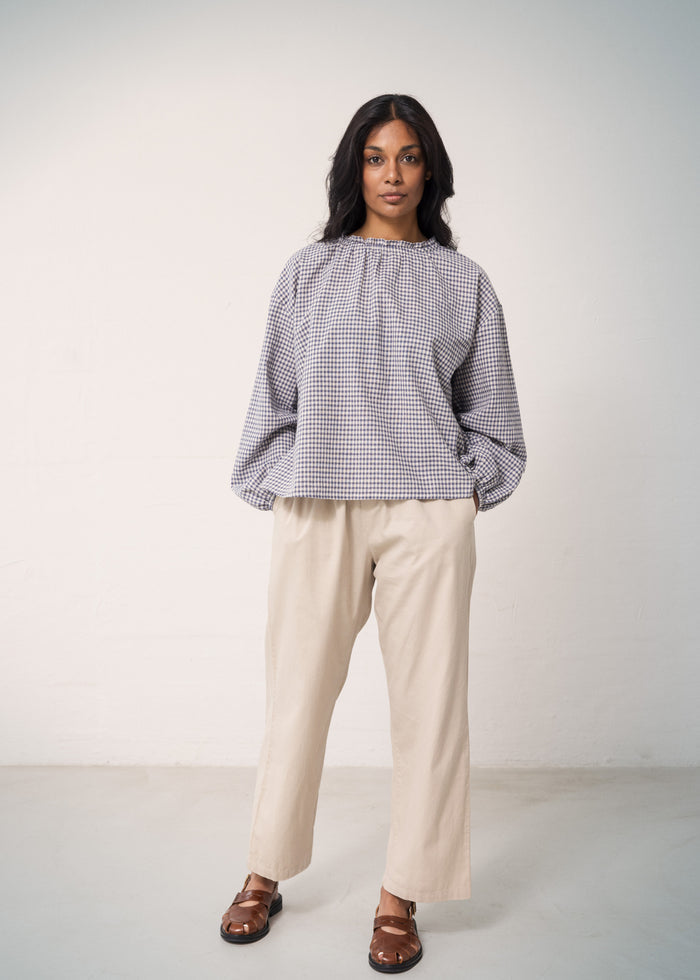 Blouse with checks, dark and light, long puff sleeves and a lightly gathered collar