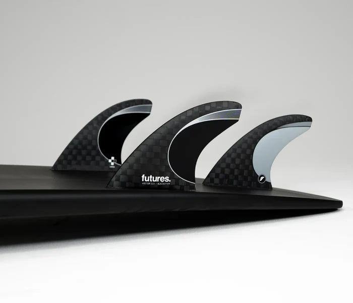Vector 3/2 Blackstix+ Thruster Large Futures Fins installed on surfboard view